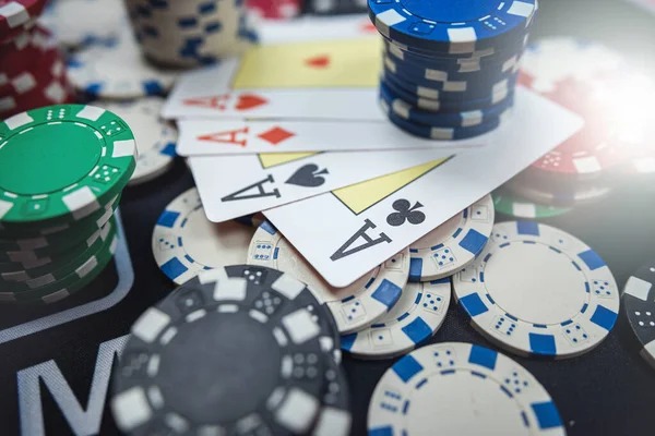 wingslot168 live dealer Caribbean Stud Poker table with multiple camera angles showing community cards and player positions